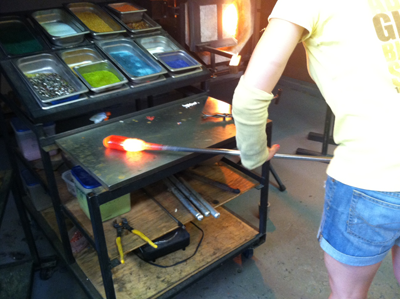 Our instructor, lengthening the glass prior to pumpkin shaping