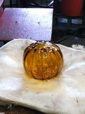 The pumpkin awaits its stem