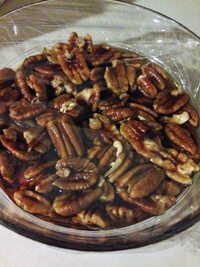 Pecans soaking in bourbon