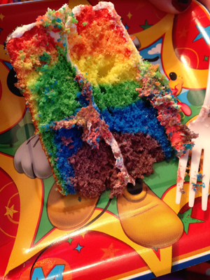 A cut slice of the DisneySide cake, made with the Duff Goldman Tie-Die Cake Mix