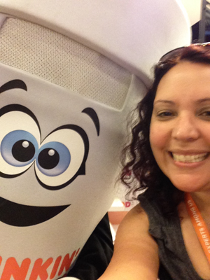 Dunkie of Dunkin Donuts taking a selfie with me at the Expo